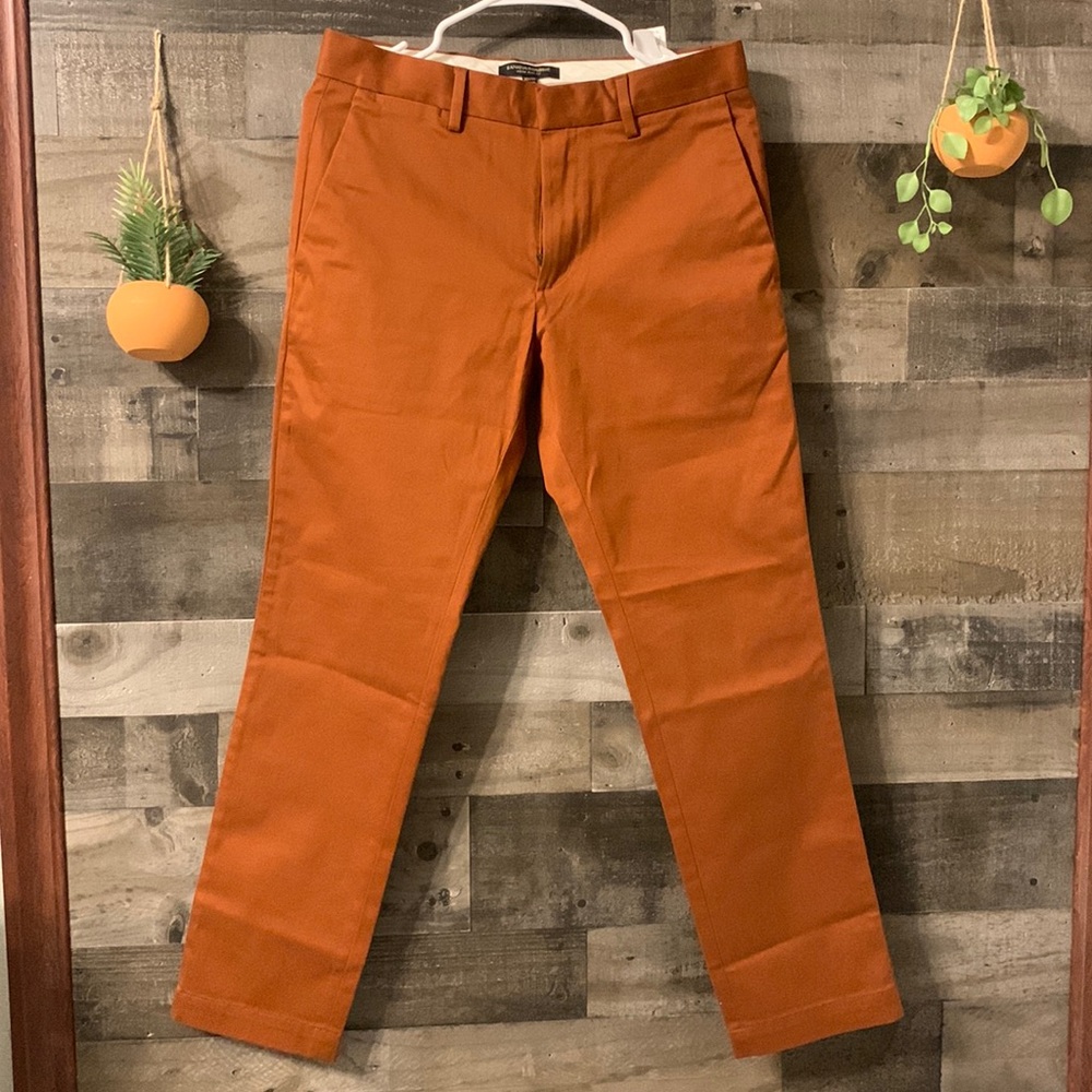 Burnt orange feel like dress pant material. 30x30 aiden slim fit